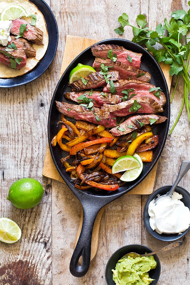 Steak Fajita meat and peppers in cast iron pan