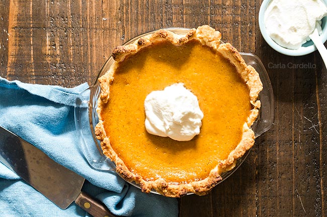 Small Pumpkin Pie with whipped cream on top