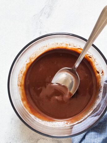 Glass bowl filled with chocolate ganache