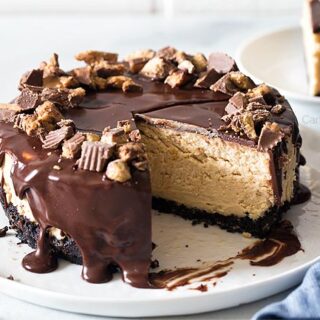Peanut butter cheesecake with a slice cut