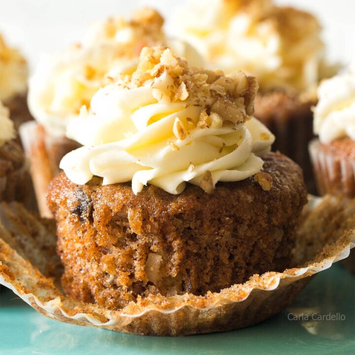 Close up of unwrapped carrot cake cupcake