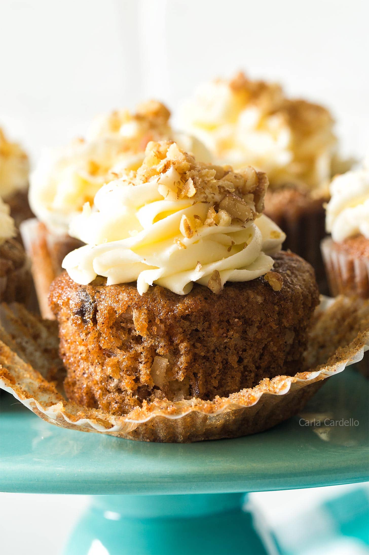 Close up of unwrapped carrot cake cupcake