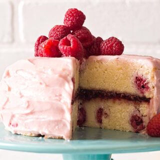 Lemon raspberry cake on turquoise cake stand