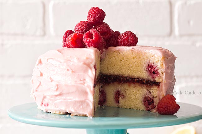 Lemon raspberry cake on turquoise cake stand