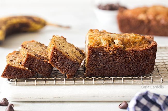 Sliced mini banana bread on cutting board