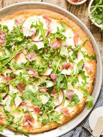 Close up of Arugula Prosciutto Pizza