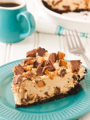 Slice of no bake peanut butter pie on teal plate