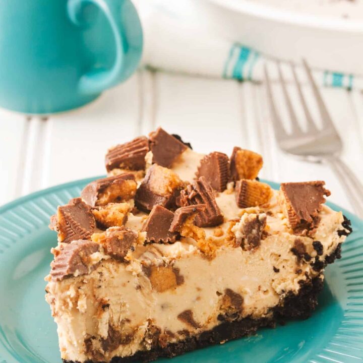 Slice of no bake peanut butter pie on teal plate