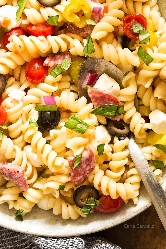 Close up of Antipasto Pasta Salad with spoon