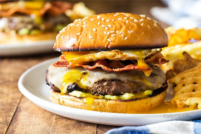 Breakfast burger on a plate with waffle fries