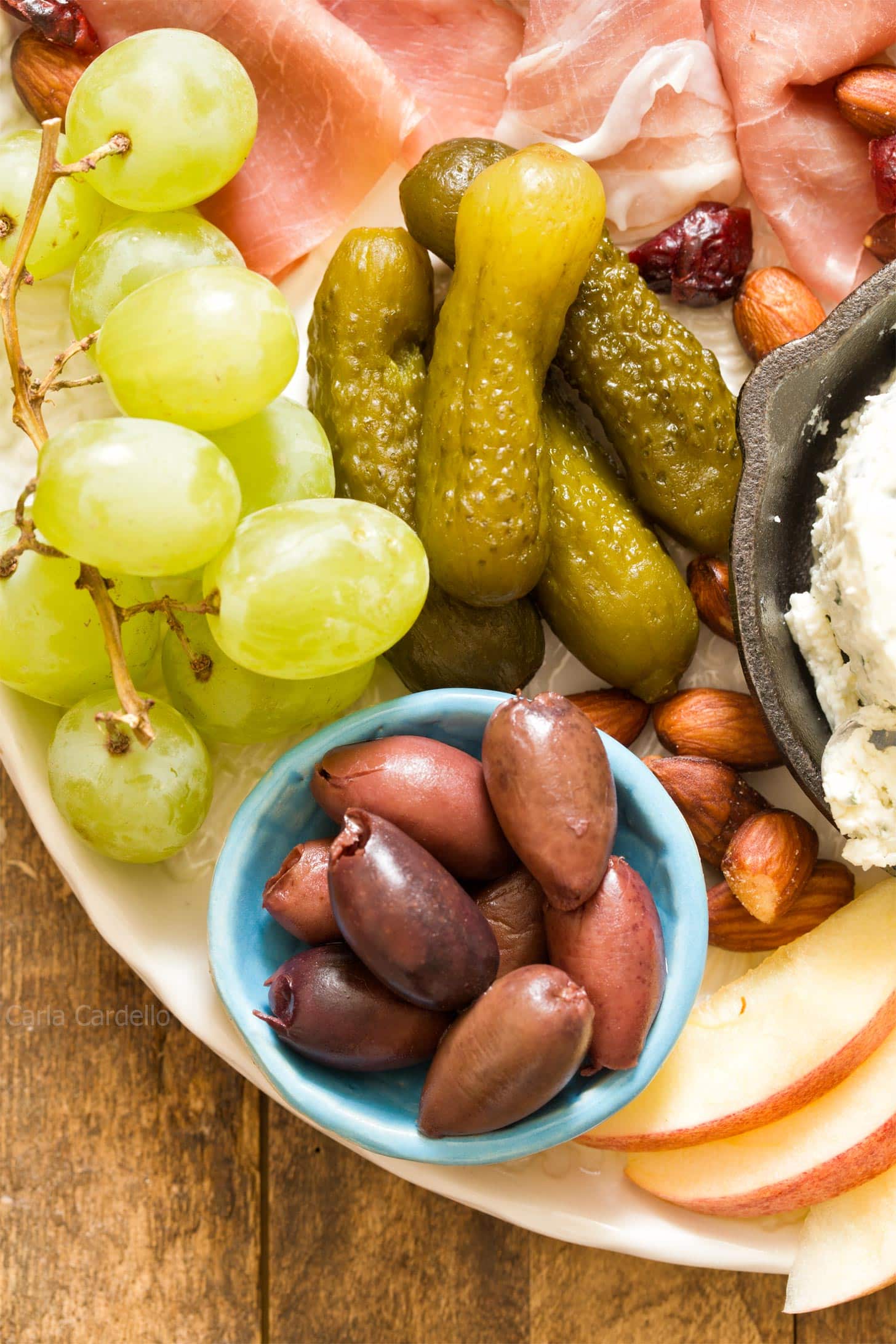 Close up of olives on cheese board