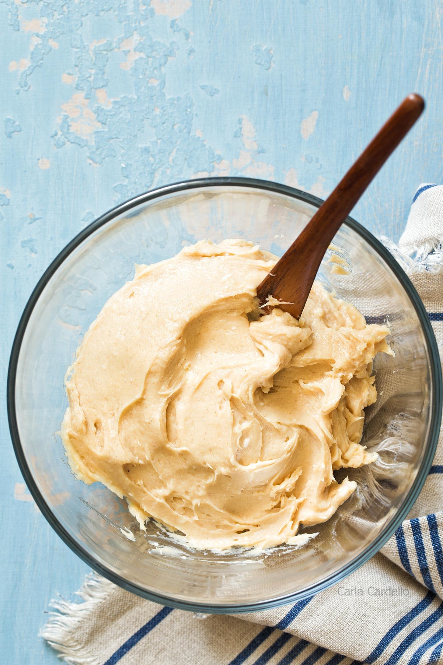 Glass bowl with peanut butter cream cheese frosting