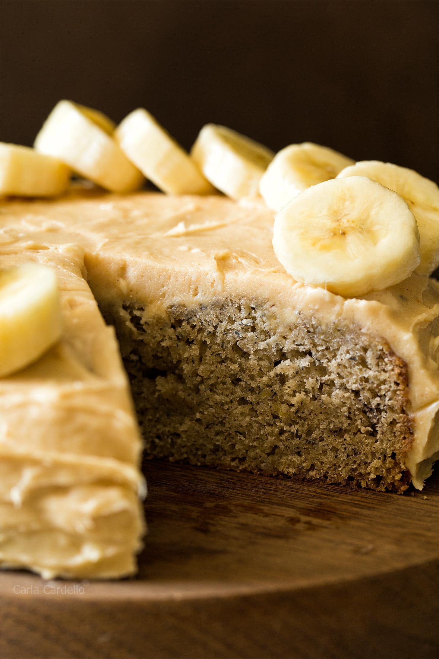 Close up of banana cake with cream cheese frosting