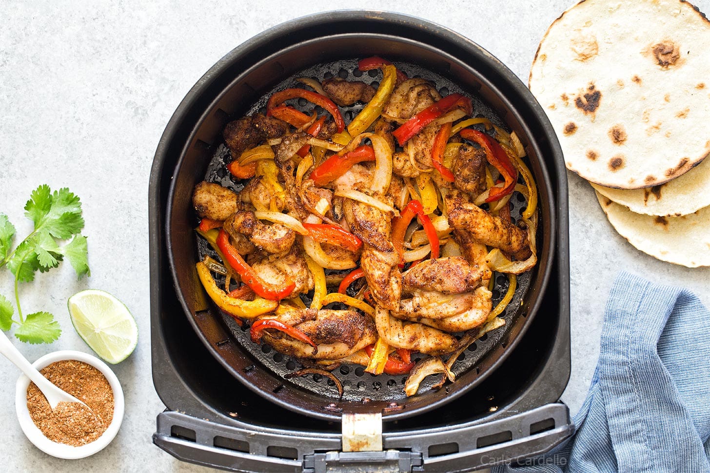 Chicken Fajitas in an air fryer basket