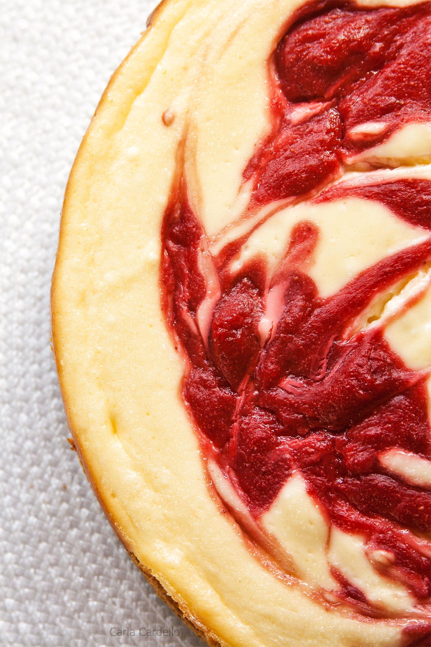 Close up of strawberry swirl cheesecake