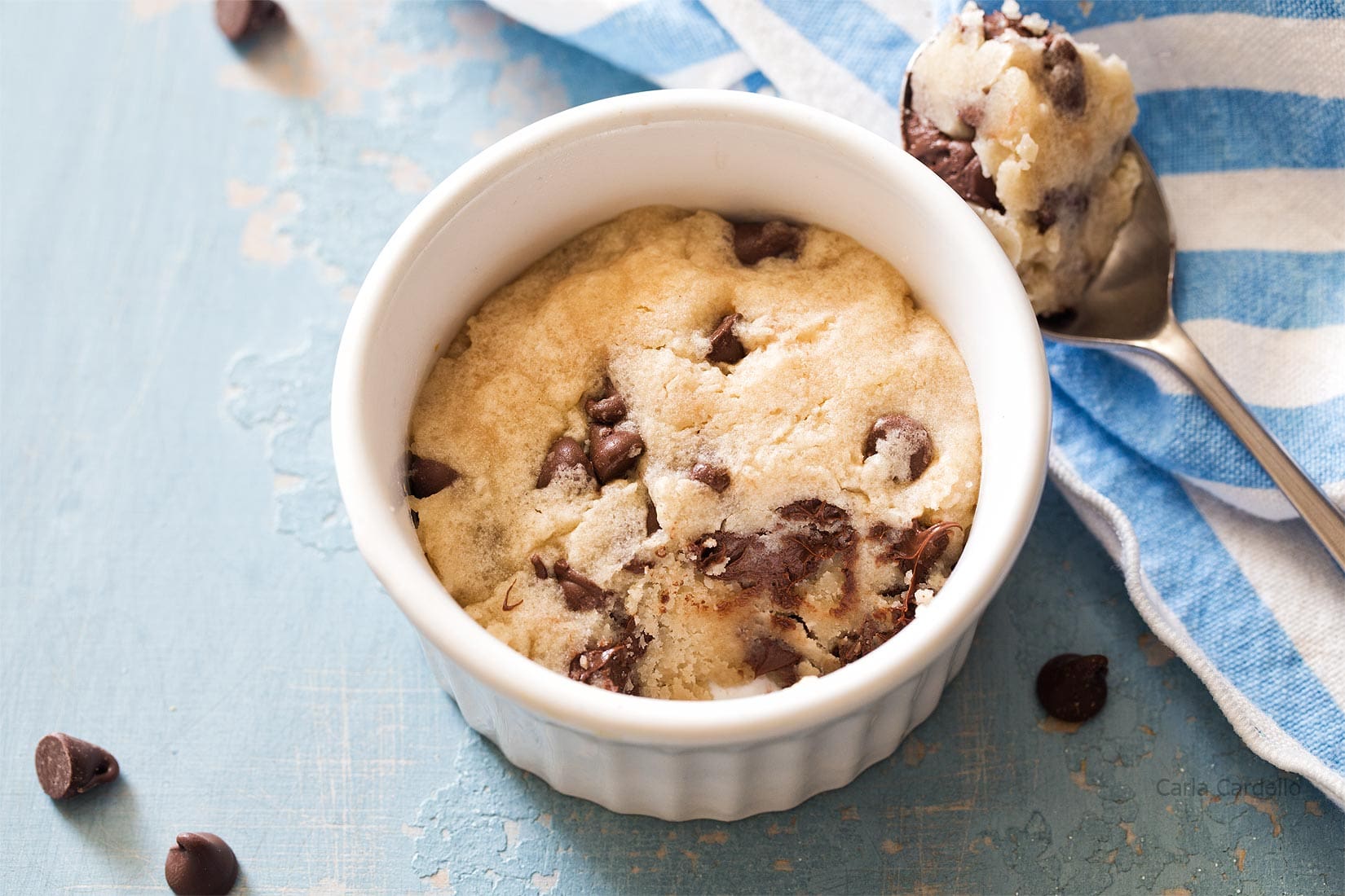 Microwave chocolate chip cookie in a ramekin with bite taken out