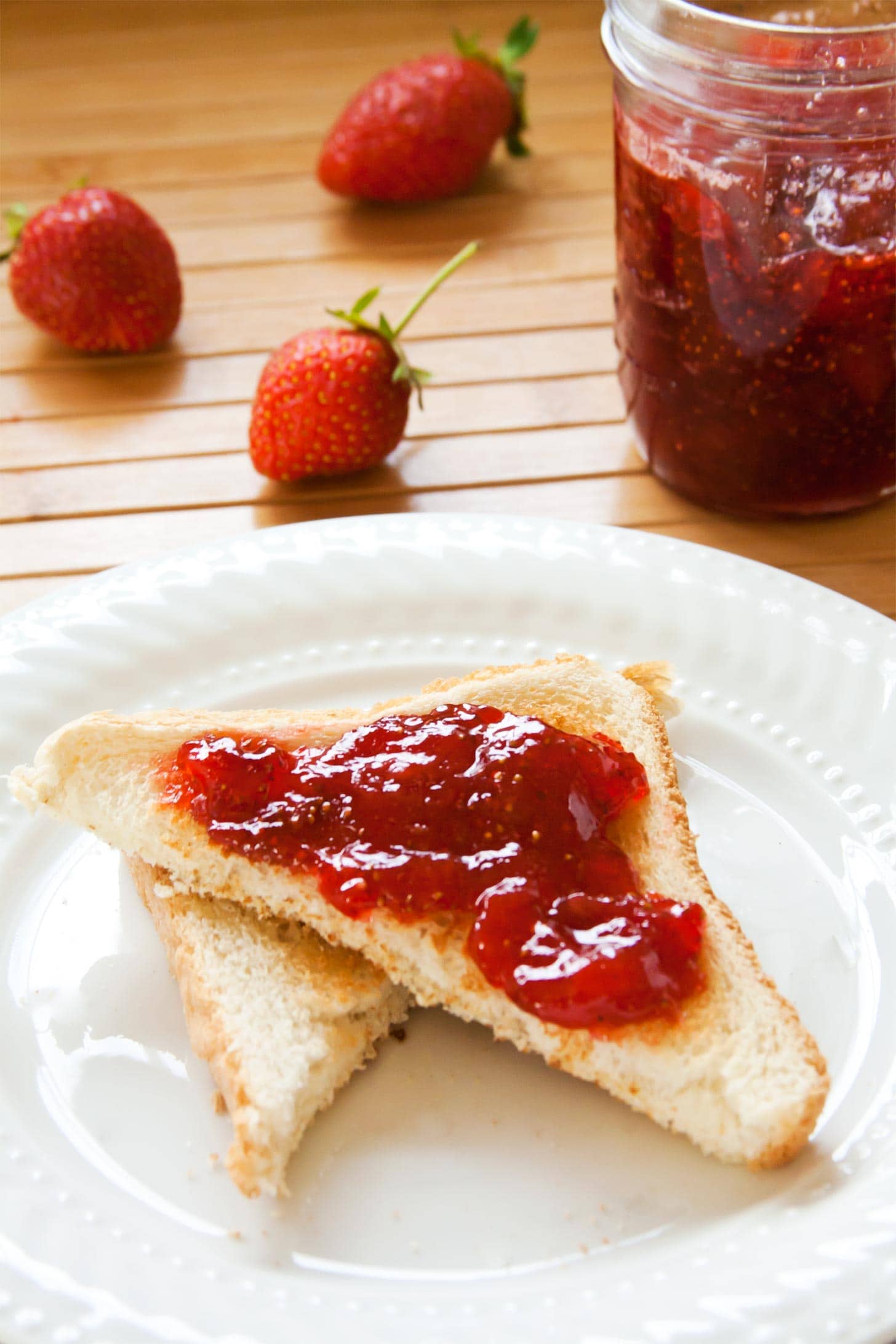 Strawberry jam without pectin spread onto toast