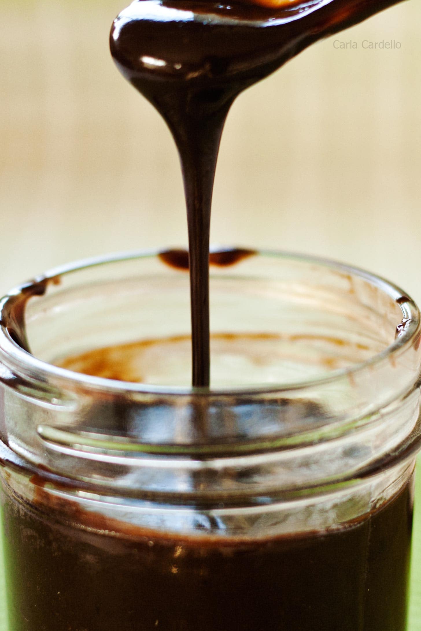 Nutella Sauce drizzling back into its jar