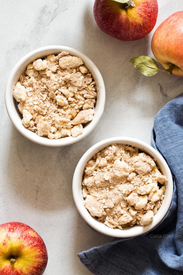 Streusel on top of apple crisps waiting to be baked