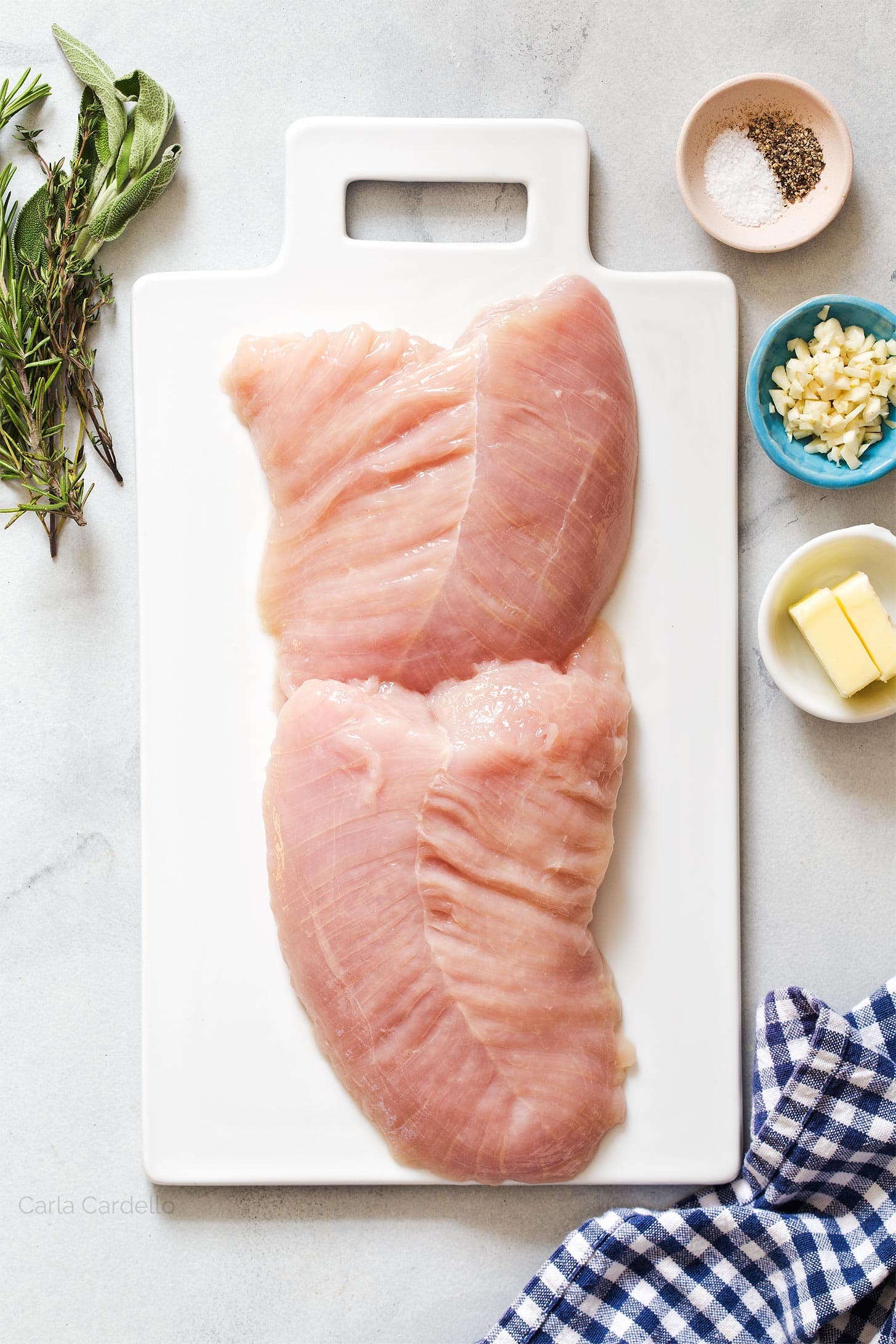 Turkey tenderloin on cutting board