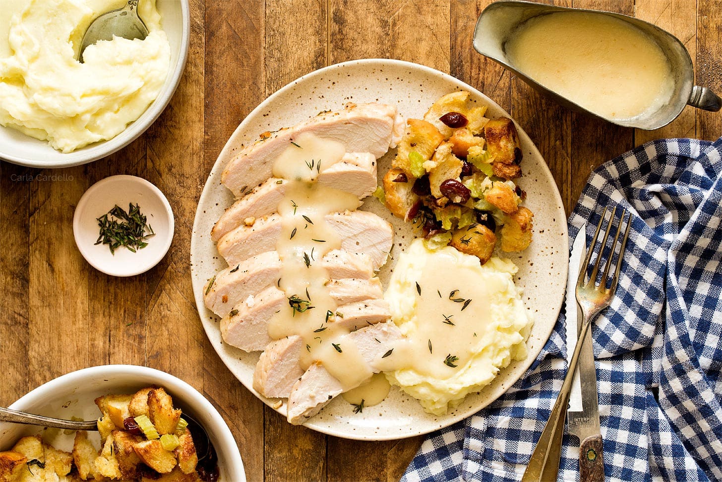 Small Thanksgiving dinner with turkey tenderloin, stuffing, mashed potatoes, and gravy