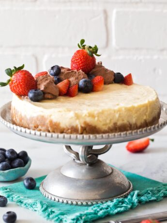 Instant Pot Cheesecake on a silver cake stand