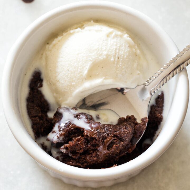 Microwave Brownie with vanilla ice cream in ramekin