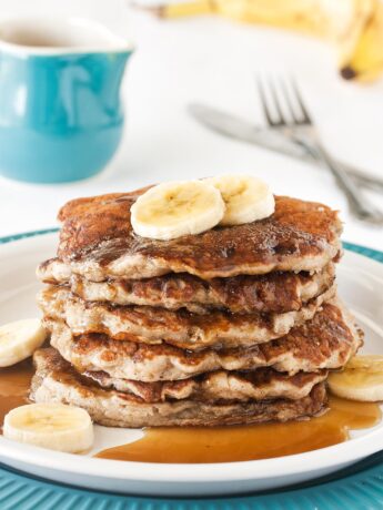 Stack of coconut milk pancakes with banana