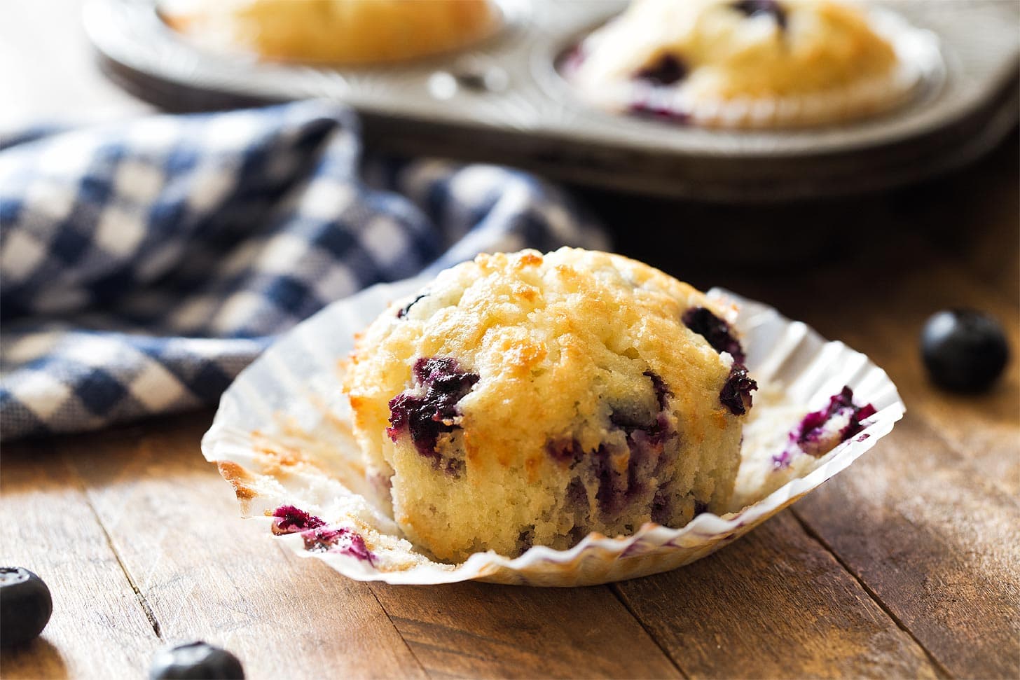 Unwrapped blueberry muffin