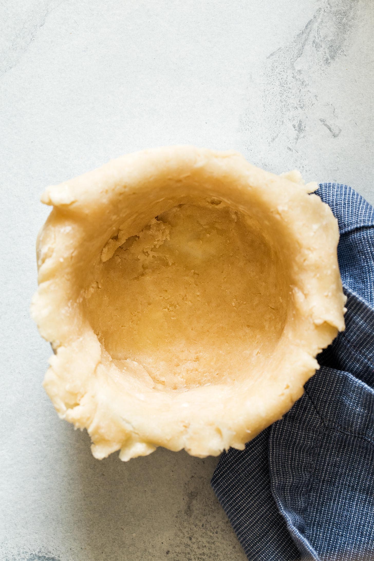 Making cherry pie with bottom pie crust