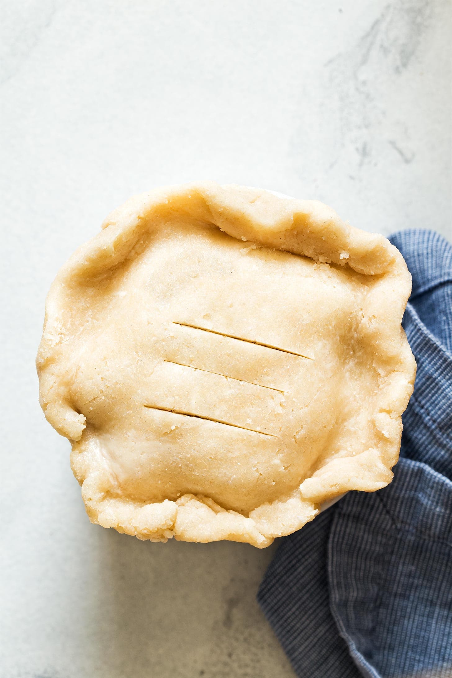 Adding top crust to cherry pie