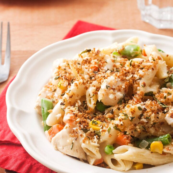 Close up of chicken pot pie pasta on a white plate