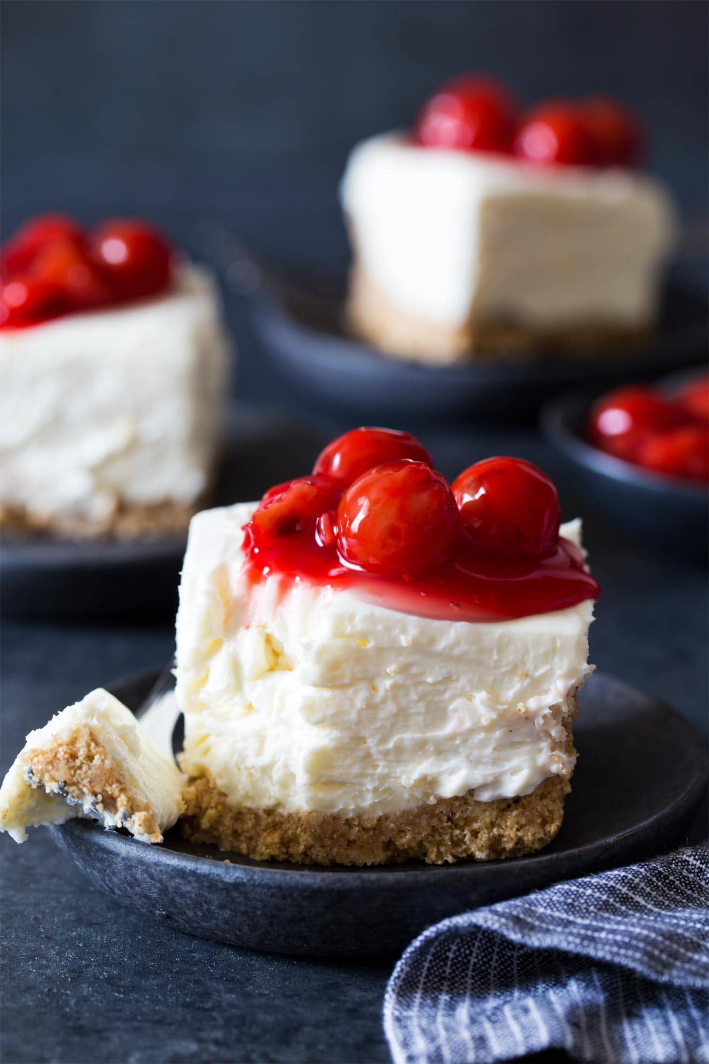 No Bake Cheesecake Bars with a bite taken with a fork
