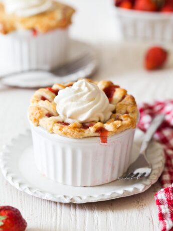 Mini Strawberry Pies in ramekins with whipped cream