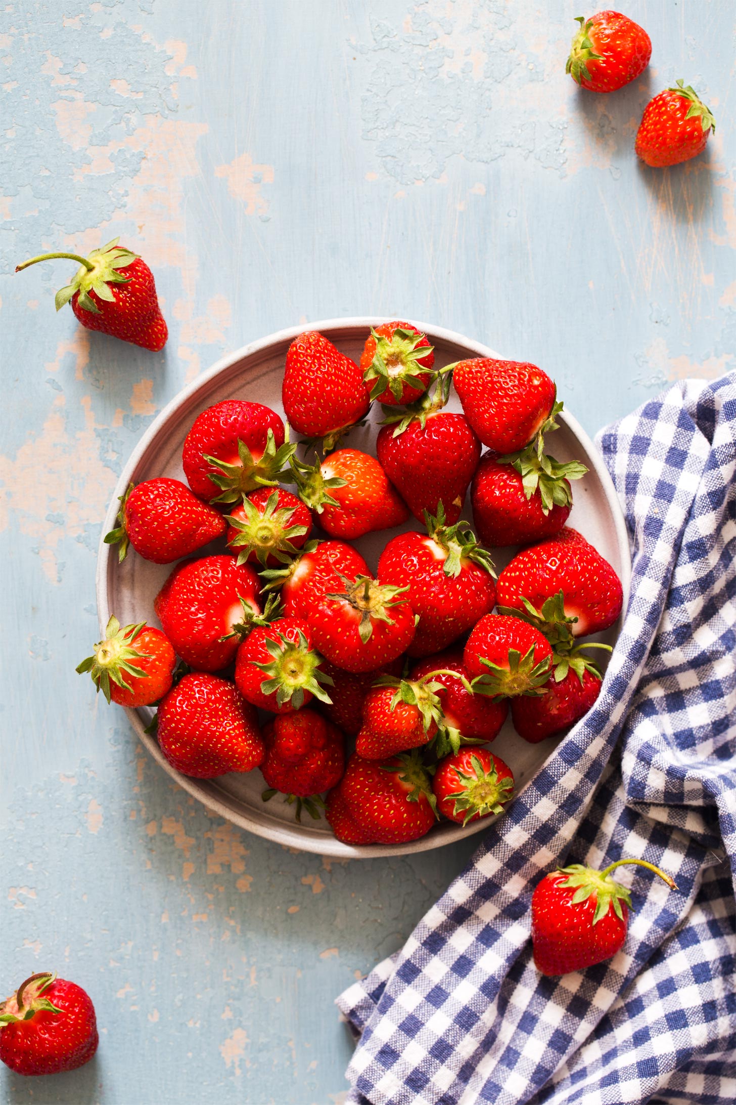 Fresh strawberries on a plate to make strawberry pie