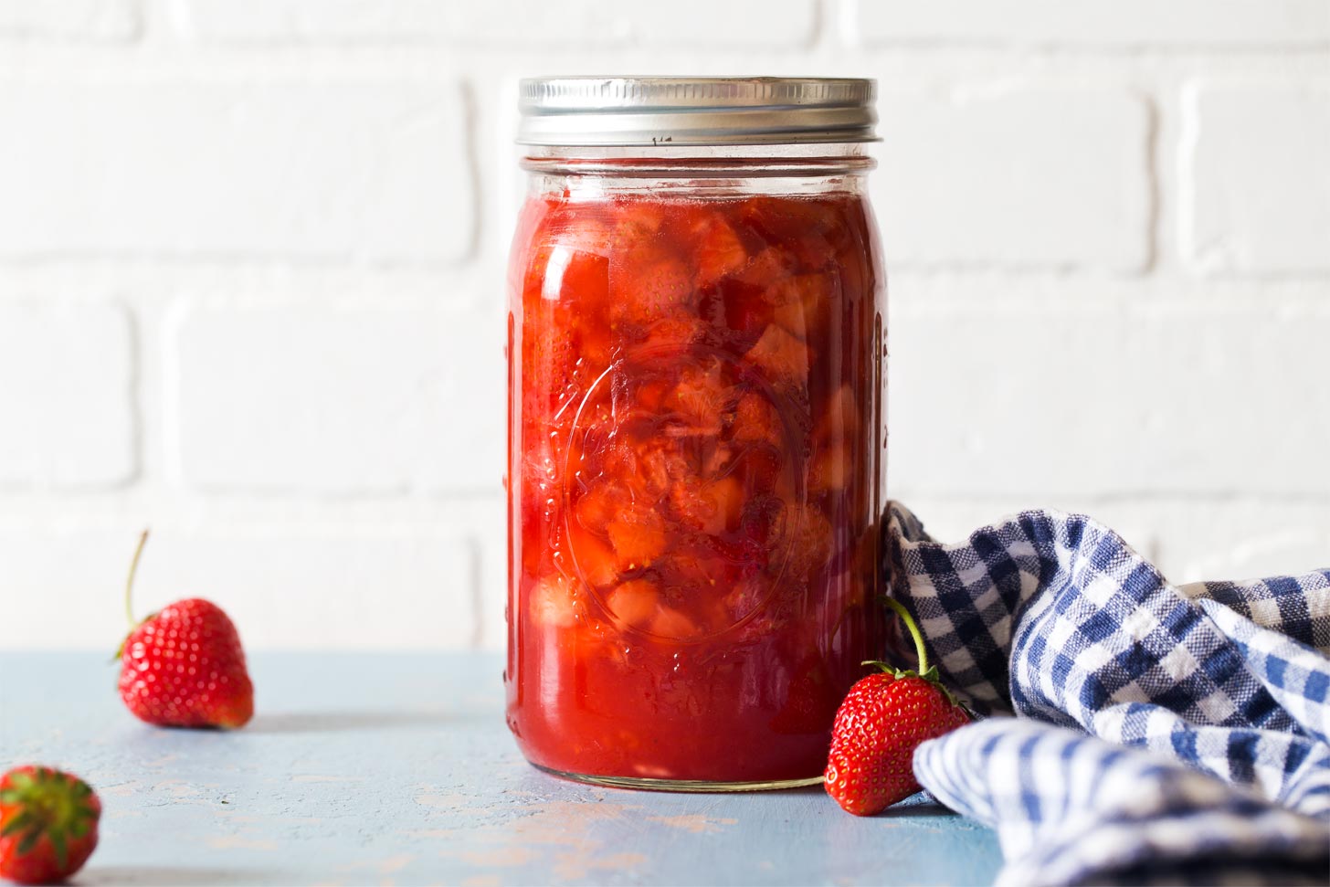 Jar with homemade strawberry pie filling