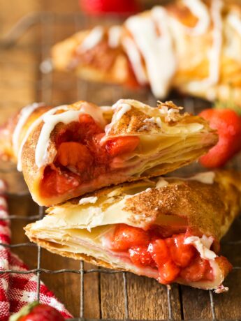 Strawberry Turnovers cut in half with strawberry pie filling