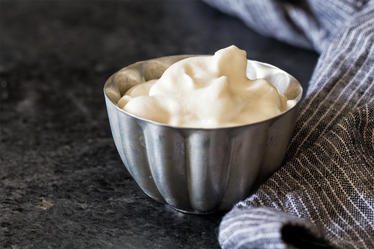 Chantilly cream in a silver bowl