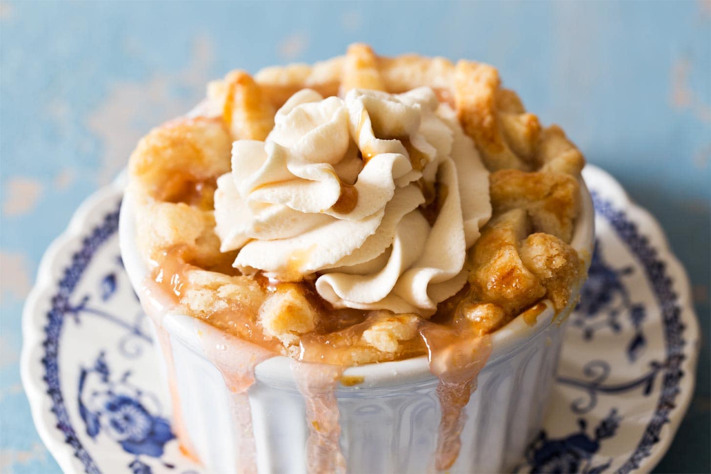 Whipped cream with honey on top of peach pie