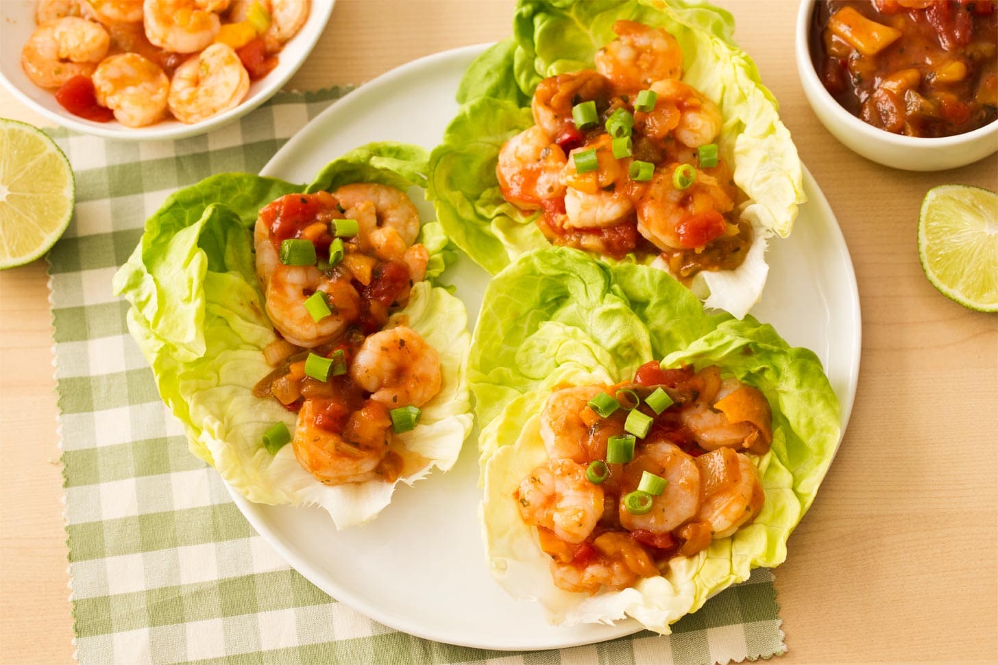 Shrimp Lettuce Boats on a white plate with salsa