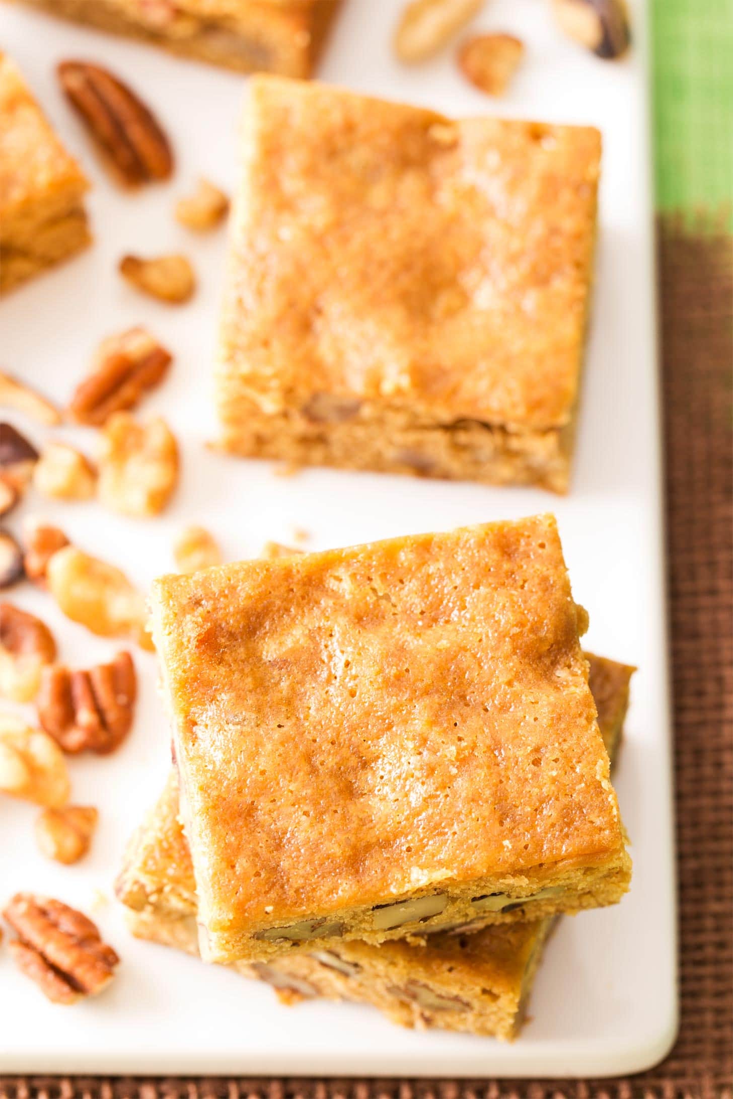 Banana Bread Blondies overhead on a white cutting board