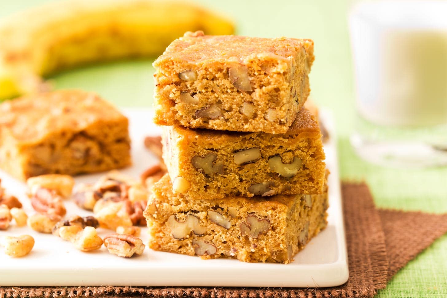 Stack of banana blondies on cutting board