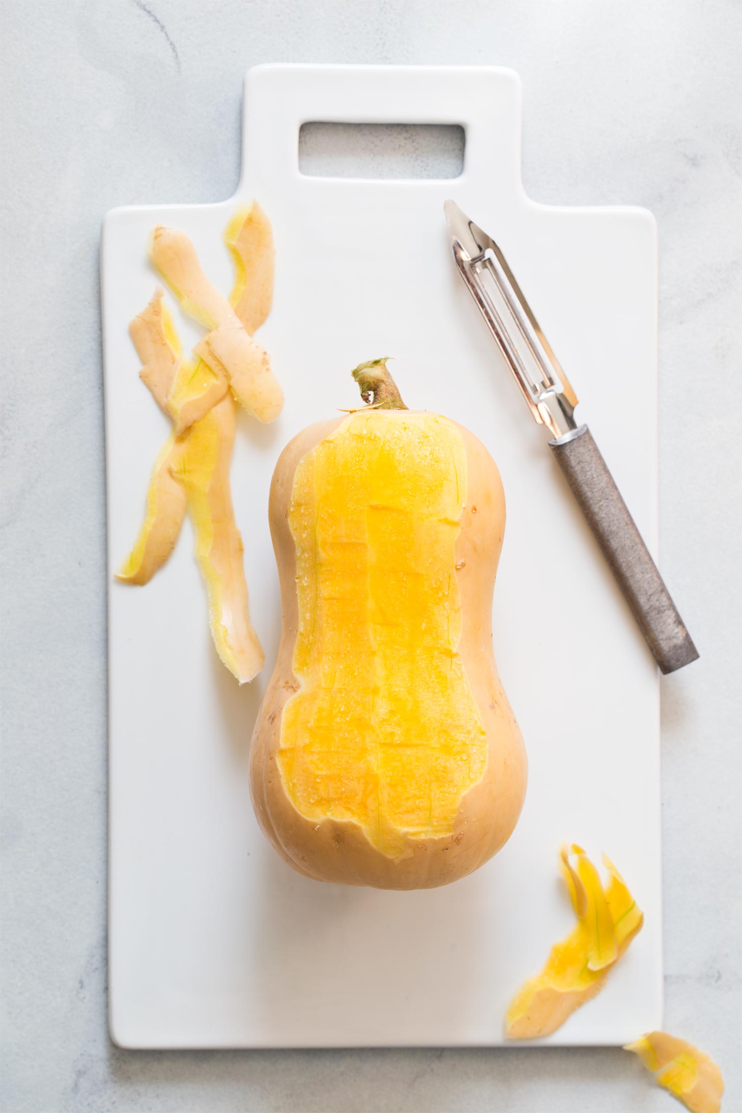 Peeling butternut squash