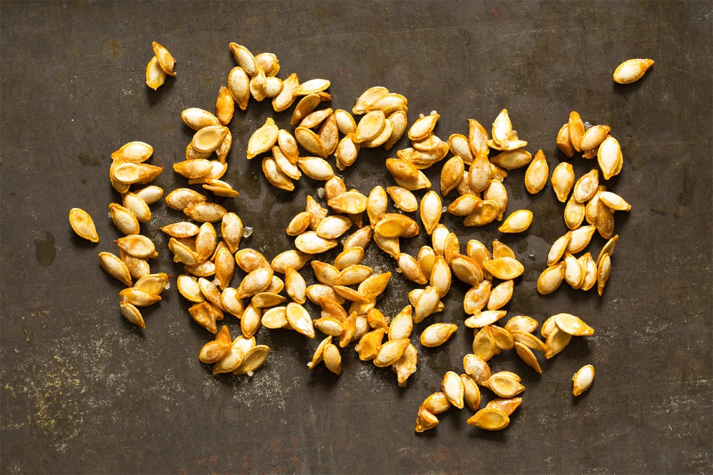 Roasting butternut squash seeds on cookie tray
