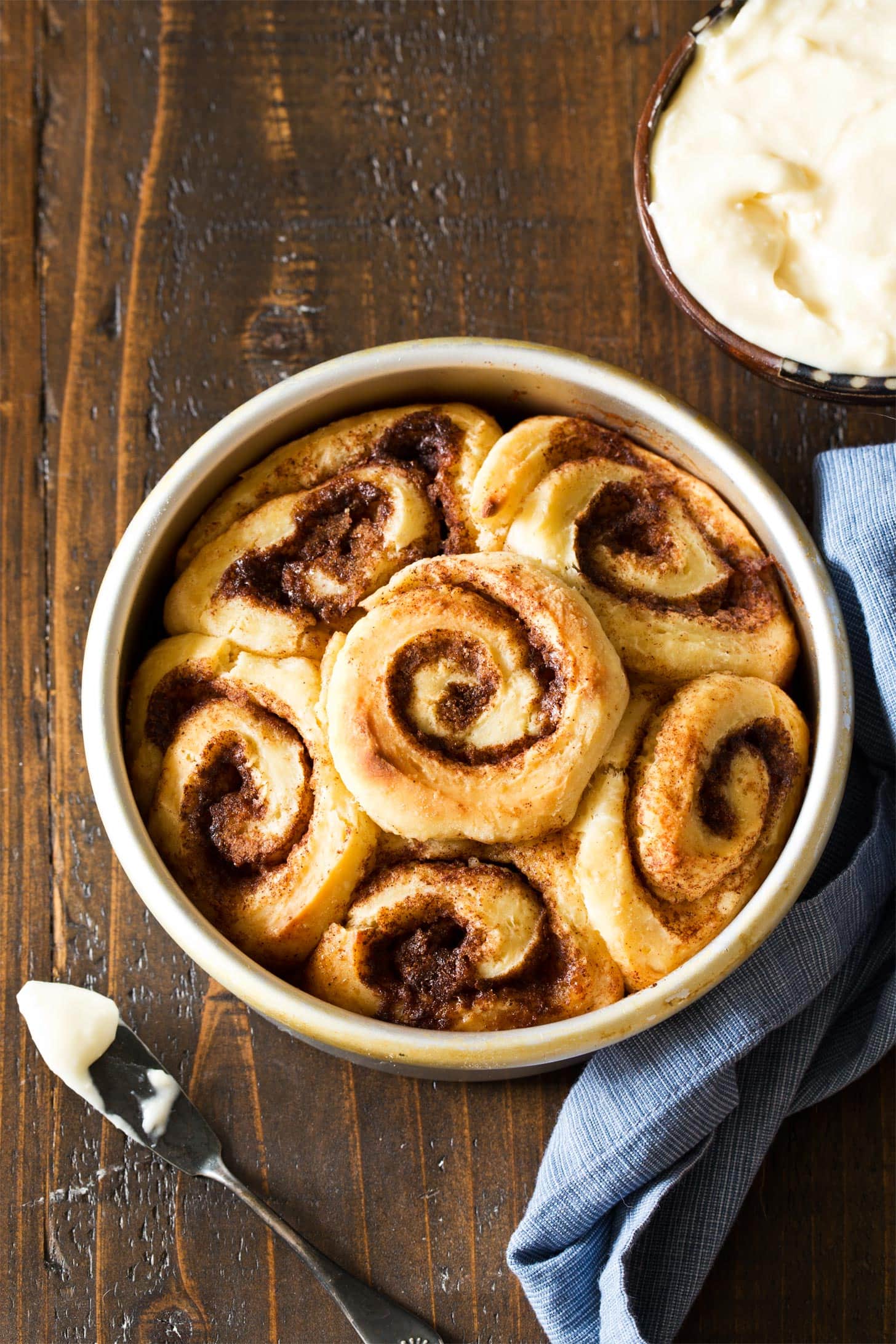 Getting ready to frost cinnamon rolls from scratch
