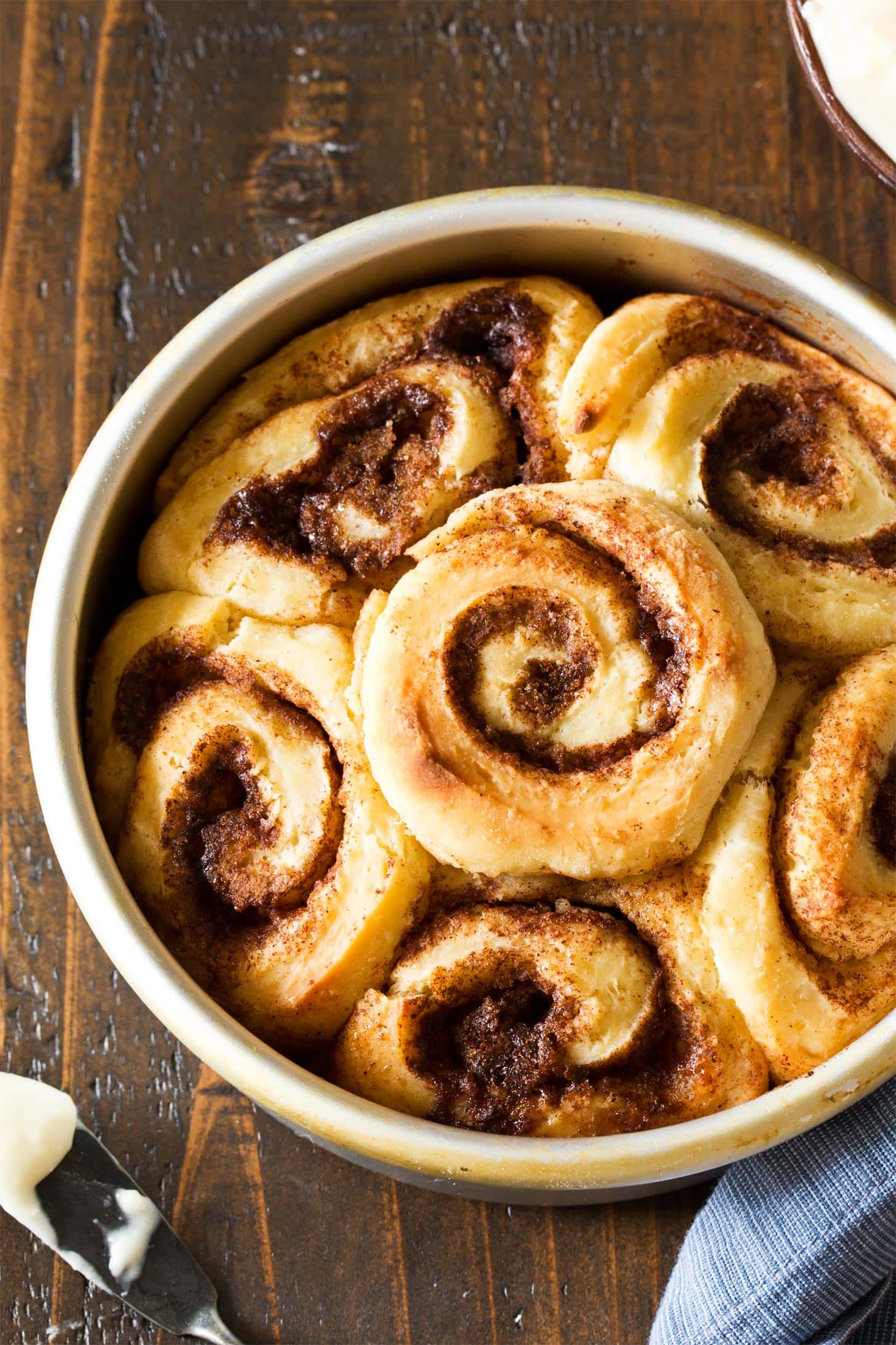 Close up of small batch cinnamon rolls in round pan