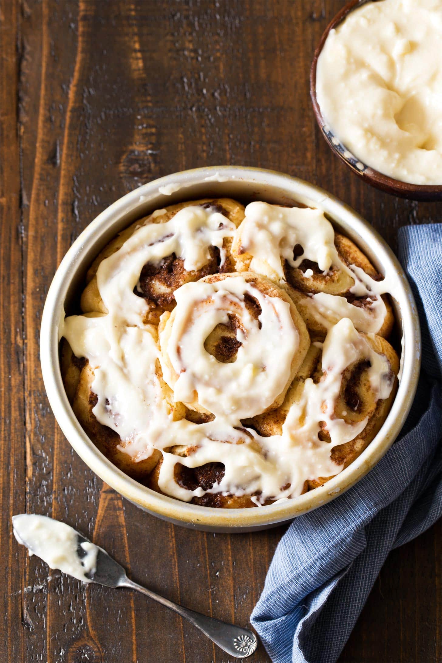 Small Batch Cinnamon Rolls frosted in a round pan