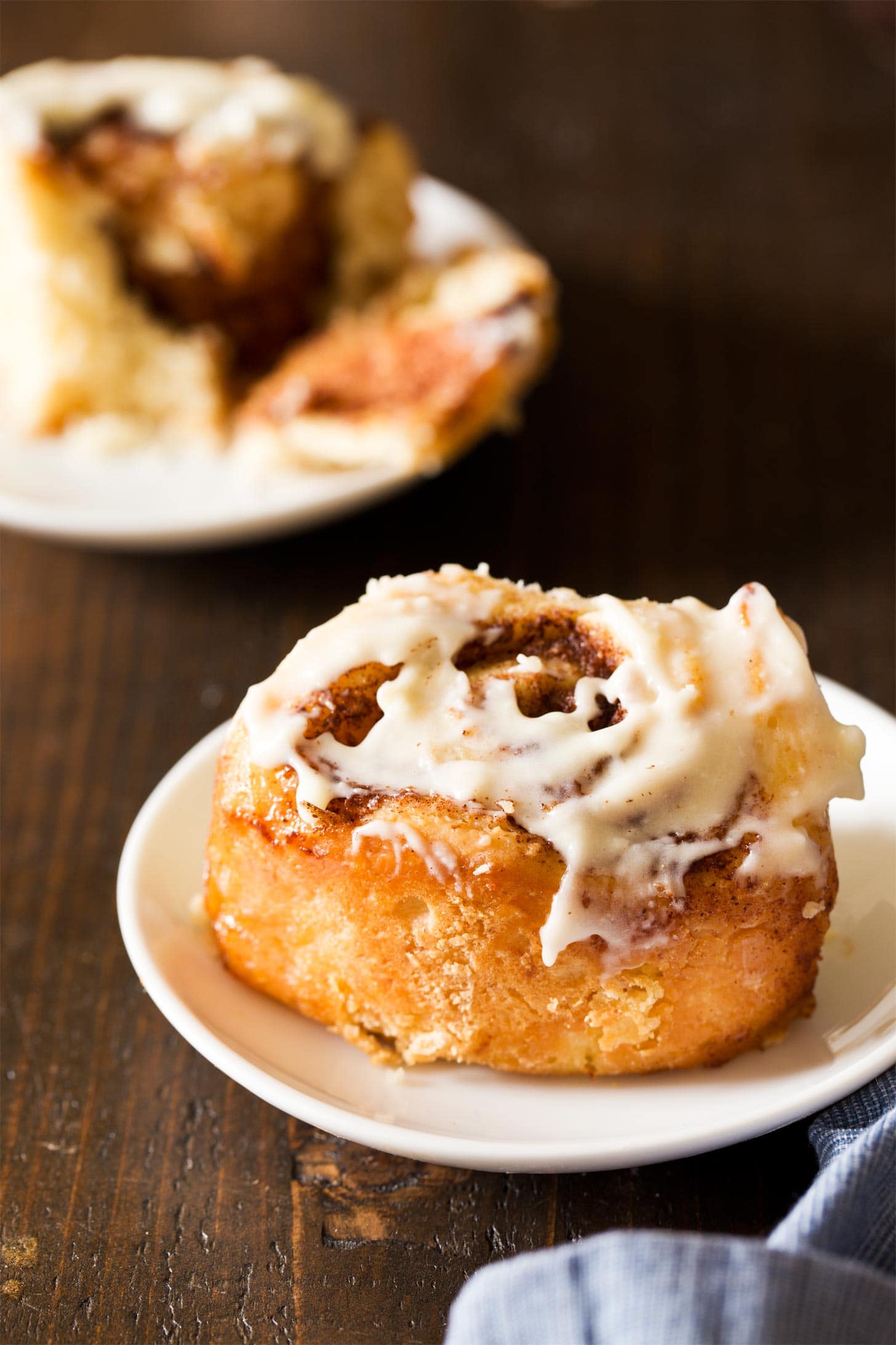 Overnight cinnamon rolls on white plates
