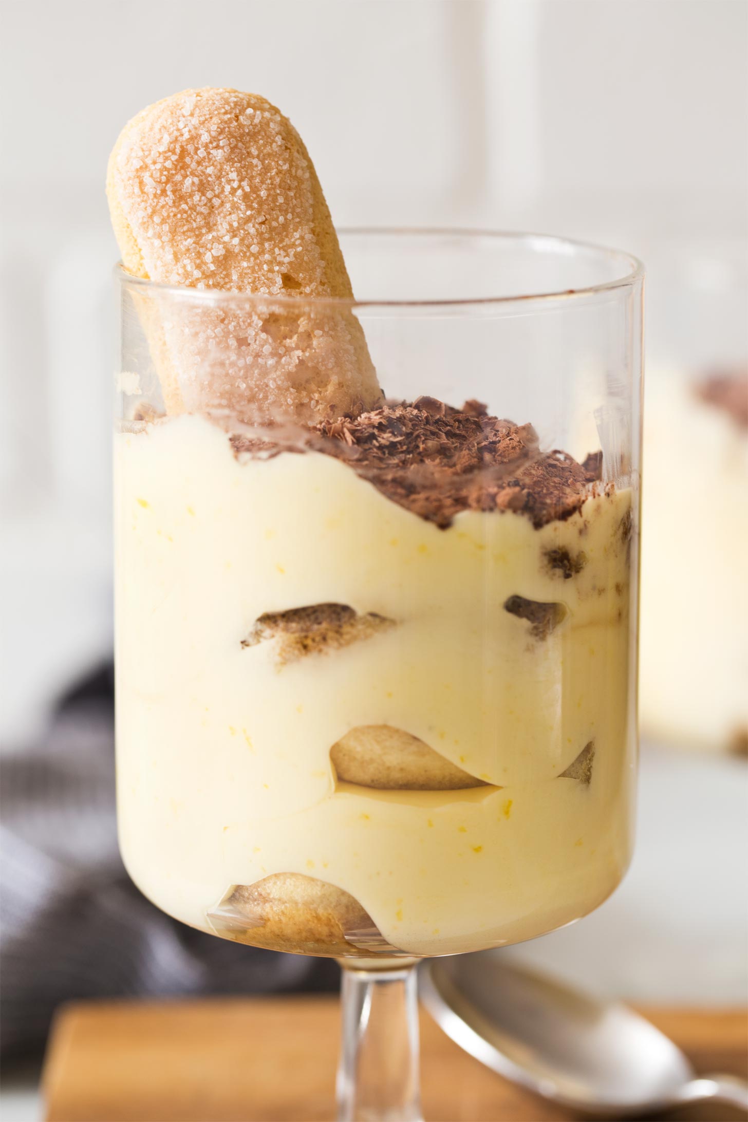 Close up of small batch tiramisu in serving glass