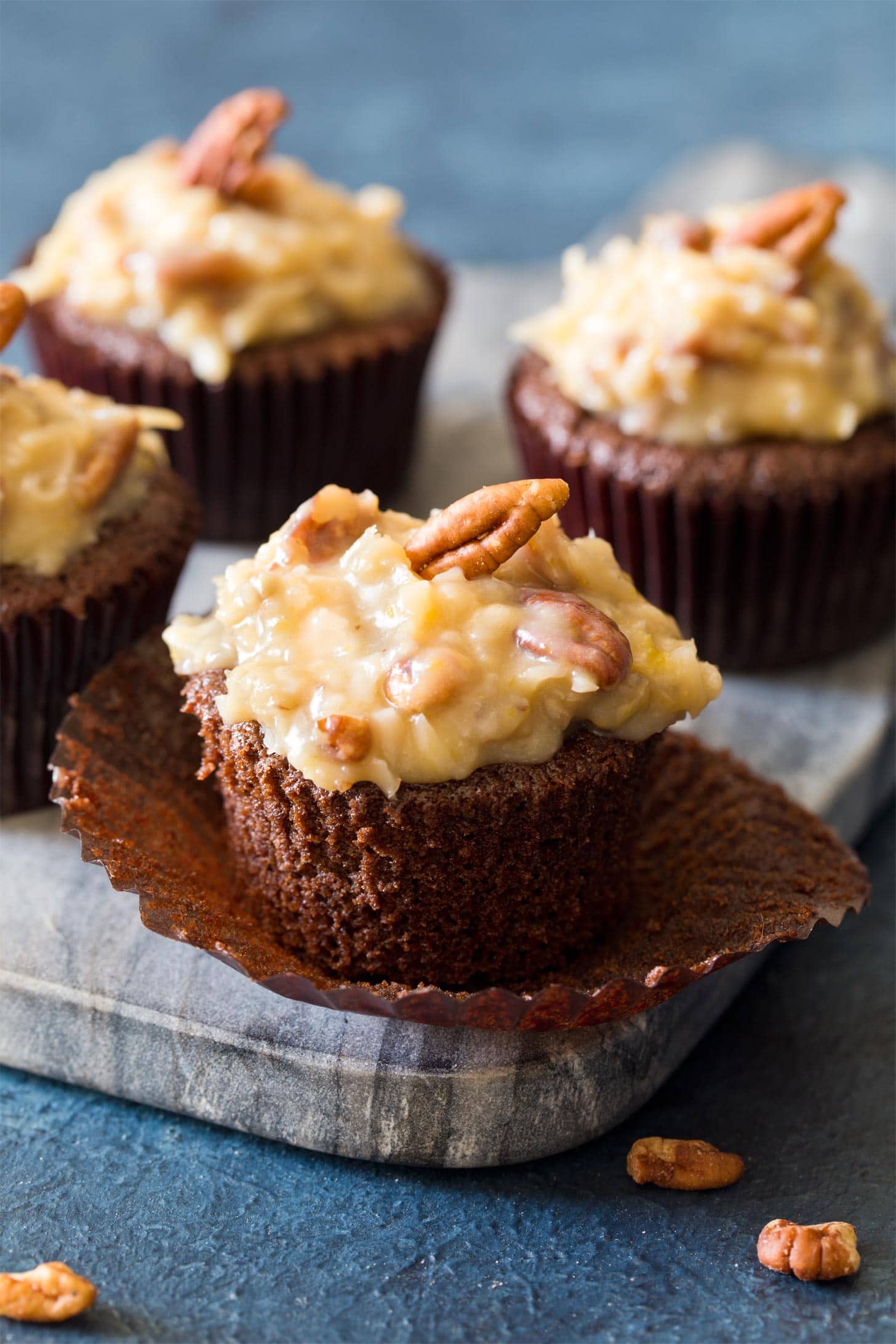 Group of German chocolate cupcakes on serving board